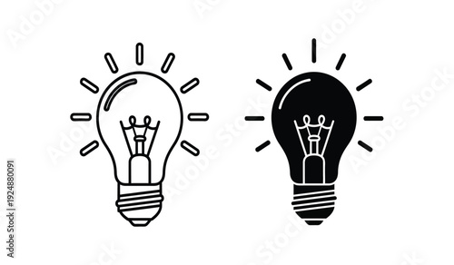 Two light bulbs one glowing and one not