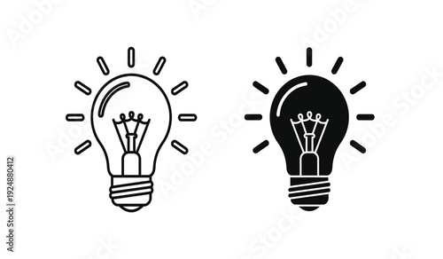 Black and white light bulb icons with rays on a pure for business or creative concepts