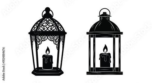Two ornate black lanterns with lit candles isolated on white background