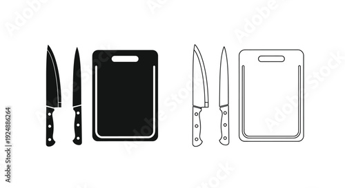 Black and white kitchen utensils knives and cutting boards