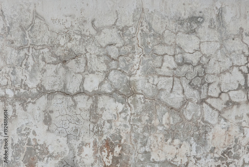 Cracked concrete wall texture with weathered surface