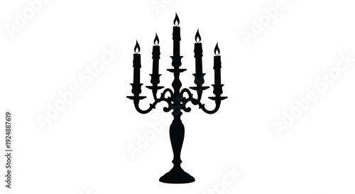 Elegant black silhouette of a seven branch candelabra with lit candles