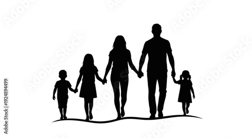 Silhouette of a family of five holding hands and walking together.