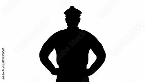 Confident police officer standing with hands on hips