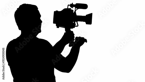 Cameraman filming with professional video camera