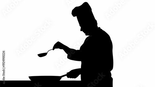 Professional chef cooking with skill and precision in kitchen