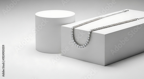 White Box and Cylinder with Necklace.