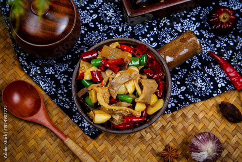 Fotografie Stir-Fried Beef with Potatoes and Peppers in Clay Pot