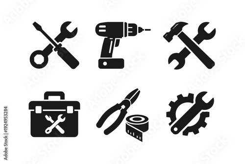 Tool and repair icon set in black glyph style: screwdriver and wrench, cordless drill, hammer, toolbox, pliers with measuring tape and gear with spanner. Concept of maintenance and DIY.