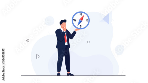 Businessman holding a compass, symbolizing direction, strategy, and decision making