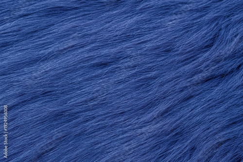 Foto Deep blue soft fluffy synthetic fur texture background providing luxurious comfo