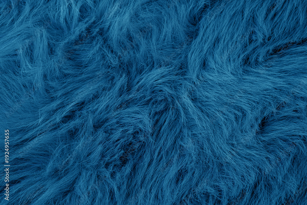 Obraz premium Abstract background of textured deep blue plush soft shaggy faux fur material fabric detail