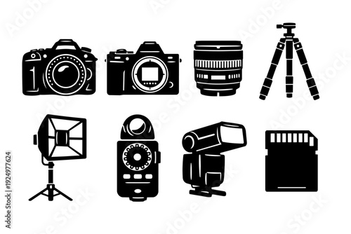 Photography equipment and gear collection, featuring cameras, lens, tripod, and flash