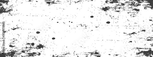 Grungy distressed black and white texture background with speckles and scratches for overlay effects