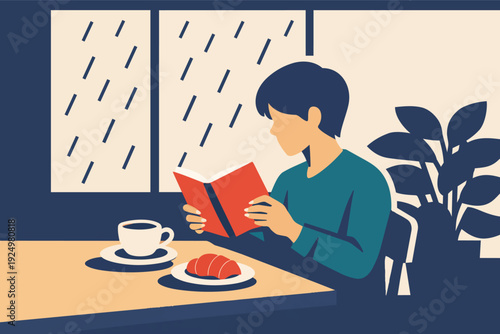 Enjoying a cozy rainy day reading book with coffee and croissant indoors