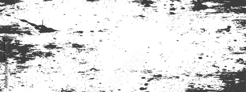 Abstract distressed grunge texture with dark splatters and scratches on a white background