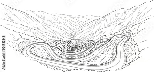 A winding road snakes through a steep, rugged mountain valley with many turns