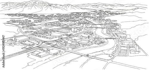 Aerial view of a sprawling city with a river, highways, and mountains in background