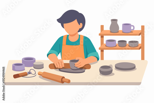 Person crafting pottery using a rolling pin at a ceramics workshop table