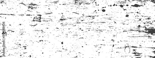 Distressed grunge texture overlay with scratches and speckles in black and white