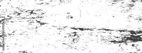 Black and white distressed grunge overlay texture background with subtle scratches and speckles for graphic design and photography effects