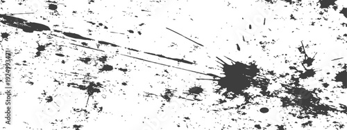 Abstract grunge ink splatters and paint texture background in black and white