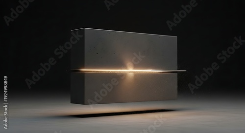 Abstract floating concrete block with a glowing golden light slit in a dark studio.
