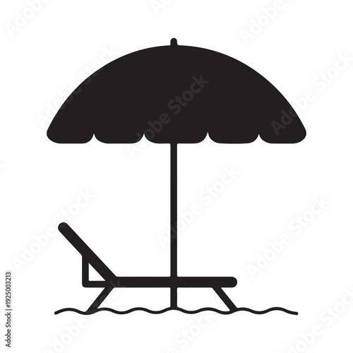 Beach umbrella and lounge chair on the shore by the sea  summer vacation and relaxation concept