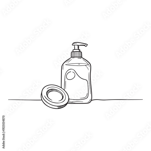 Hand soap dispenser bottle with cap on table