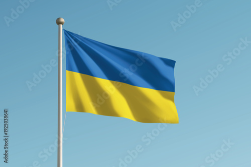 Ukraine national flag waving on pole against clear blue sky background.
