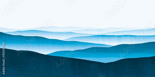 A serene mountain landscape featuring a misty range under a blue sky at sunrise with soft clouds and fog drifting over the forest valley.