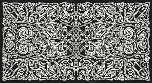 Intricate black and white Celtic knotwork pattern displaying complex interlacing lines and symmetrical historical ornamentation suitable for decorative borders and cultural designs