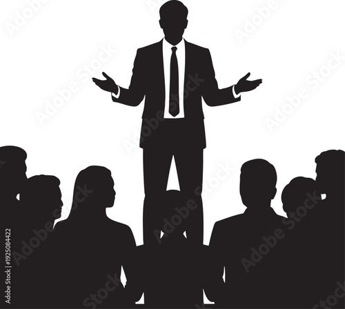 Businessman presenting to a group of people in a professional setting with a confident gesture