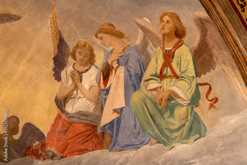 BUSTO ARSIZIO, ITALY - JANUARY 19, 2026: The fresco of angels at prayer in the church Santuario di Santa Maria di Piazza by unknow artist from end of 19. cent.