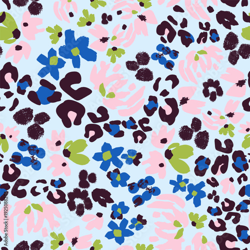 A lively seamless vector pattern combining abstract flowers and leopard spots in navy, cobalt, olive, pink, and cream on a soft sky-blue background