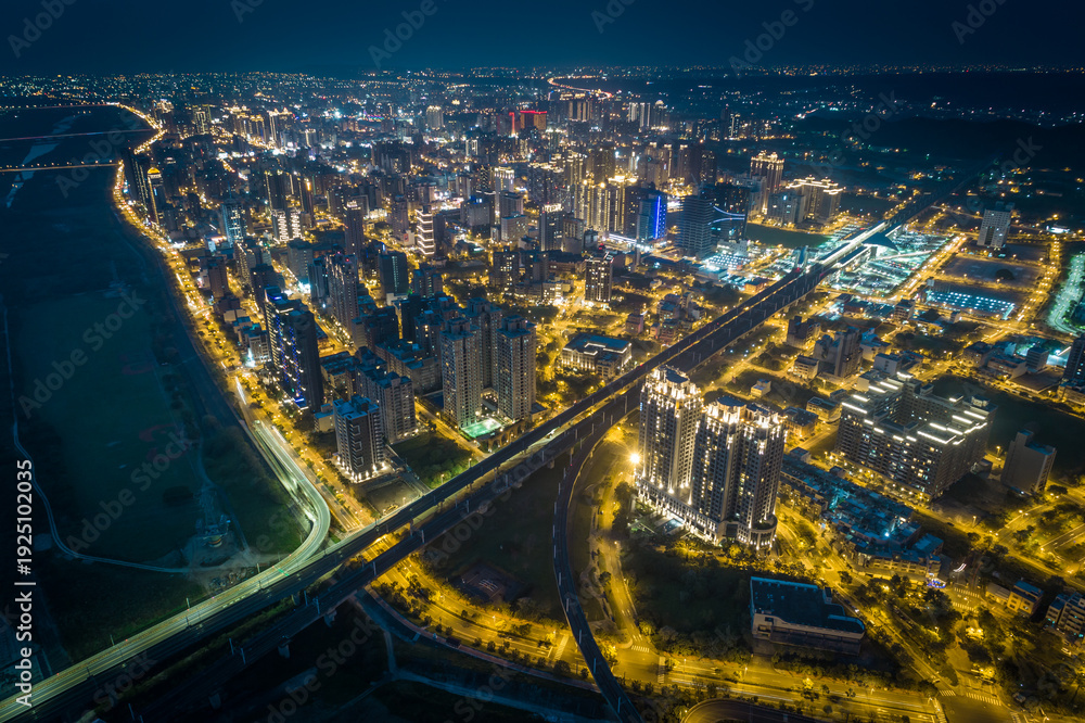 Fototapeta premium Zhubei City Skyline at Night - Asia modern business concept image, panoramic cityscape birds eye view use the drone, shot in Hsinchu, Taiwan.