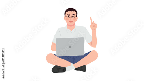 Man sitting cross-legged while using a laptop and pointing upwards with enthusiasm