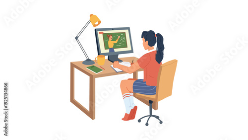 A person working on a computer at a well-lit desk with a laptop and monitor.