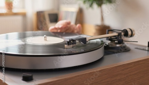 A detailed close-up of a classic vinyl record spinning gracefully on a modern turntable, capturing the warm essence of analog audio and nostalgic listening experience