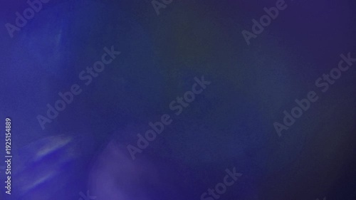 Light leak and bokeh overlay with purple and blue hues, perfect for adding artistic flair to video projects. This footage is ideal for transitions, mood setting, or atmospheric effects.