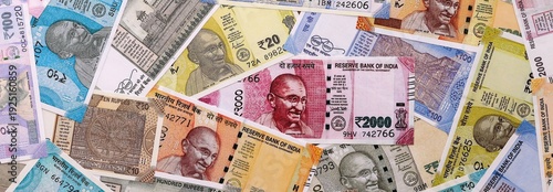 Wallpaper Mural Indian rupee money bills pile on table. India banknotes of INR currency close up. Torontodigital.ca