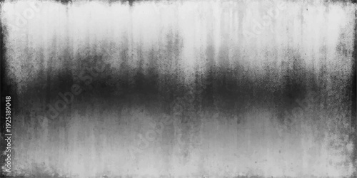 A dark vintage brushed metal plate texture with a dirty grunge steel surface and aged gray metallic pattern design on a rough black backdrop