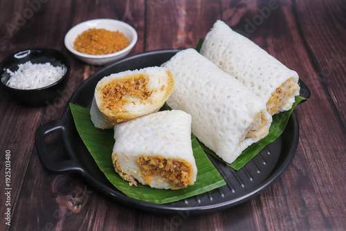 Принти на полотні A closeup shot of a traditional Goan Alle Belle coconut pancakes