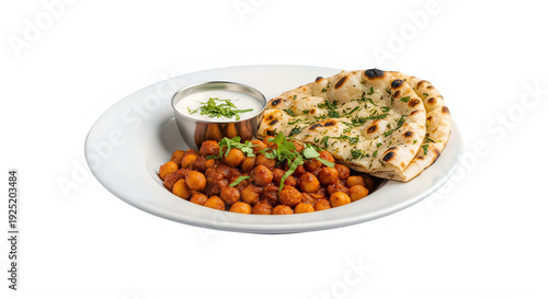 Delicious Indian food with naan bread chickpea curry and raita sauce on plate transparent background