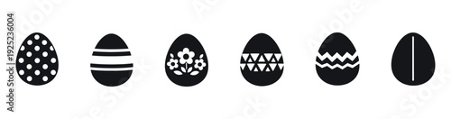 Collection of festive Easter eggs adorned with various decorative motifs like stripes, polka dots, and flowers, ideal for holiday celebration materials and spring themed promotions.