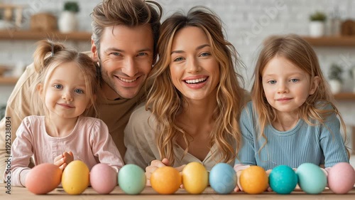 Happy family with children painting colorful easter eggs at home celebration. High quality FullHD footage