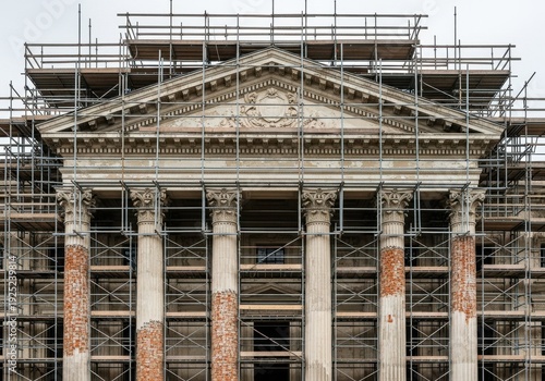 Historic Building Facade Undergoing Restoration Covered in Scaffolding, Symbolizing Urban Renewal and Architectural Preservation Investment