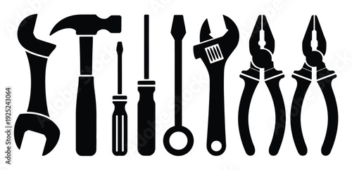 Collection of Black Silhouettes of Various Hand Tools on a White Background