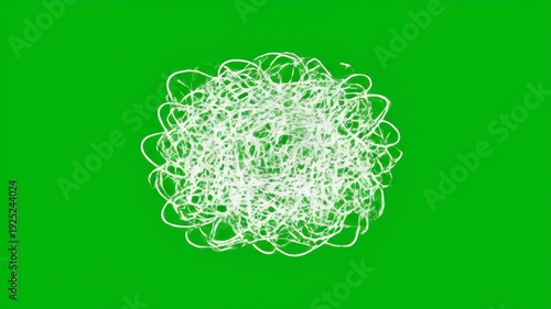 Abstract tangled white scribble on bright green screen background for digital design element and compositing