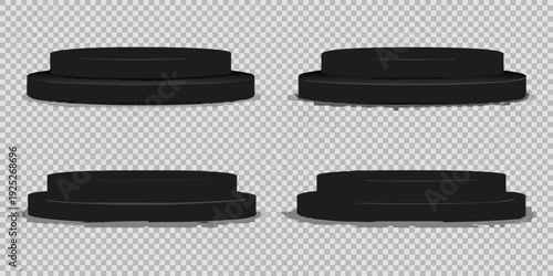 Four black cylindrical platforms or stands with slight shadows